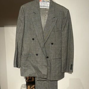 This is a 2 piece men suit in a size 38R/32R.